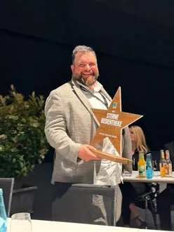 Scheck-in wird ausgezeichnet als Sterne-Bedientheke
